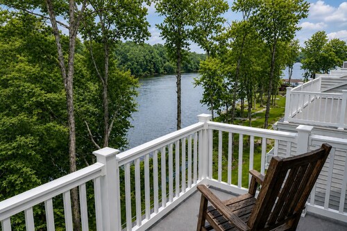 Charming lakefront retreat with game room and covered dock access