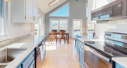 Updated lakefront home & studio with water views, hot tub, dock & game room