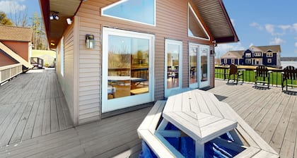 Updated lakefront home & studio with water views, hot tub, dock & game room