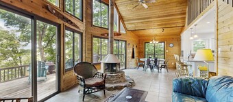 Tranquil lake cabin with private waterfront, modern kitchen, deck & sunset views