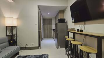 Apartment, 1 Schlafzimmer, Poolblick | Wohnzimmer