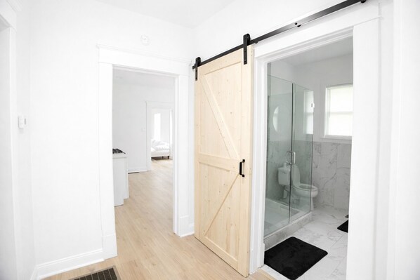 Shower, hair dryer, towels, soap