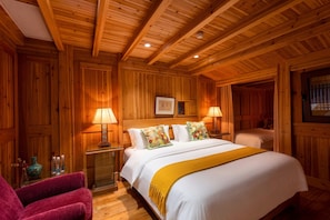 Habitación familiar con 2 camas individuales, vistas al jardín | Ropa de cama de alta calidad y decoración individual