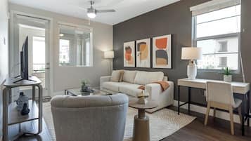 Apartment (1 Bedroom) | Living area | 50-inch TV with digital channels