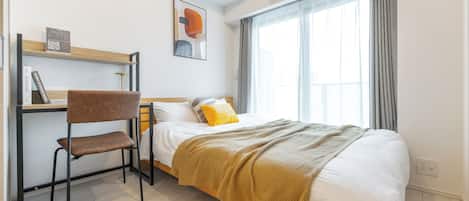 Individually furnished, desk, laptop workspace, blackout curtains
