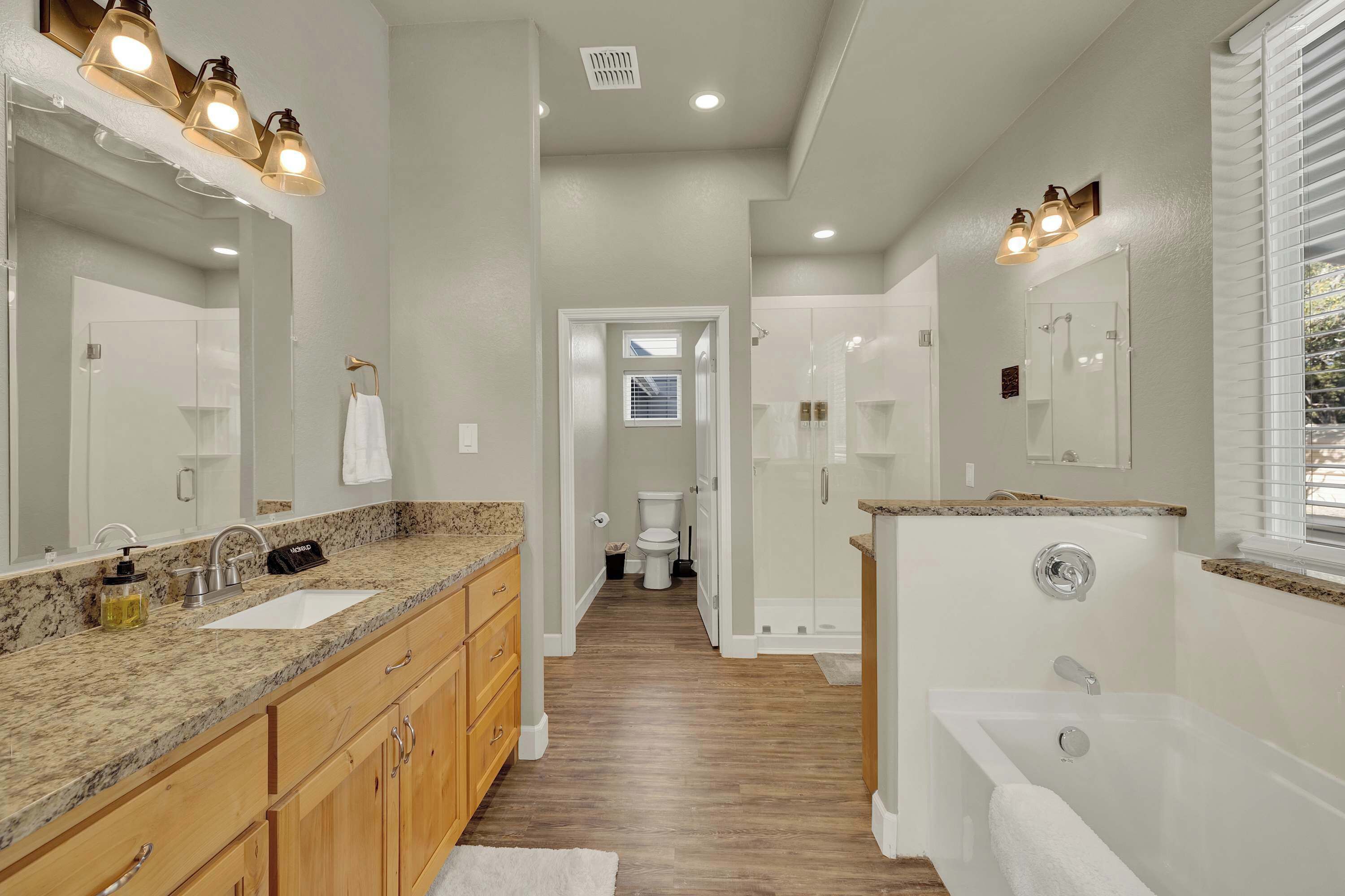 Shower, hair dryer, towels, shampoo