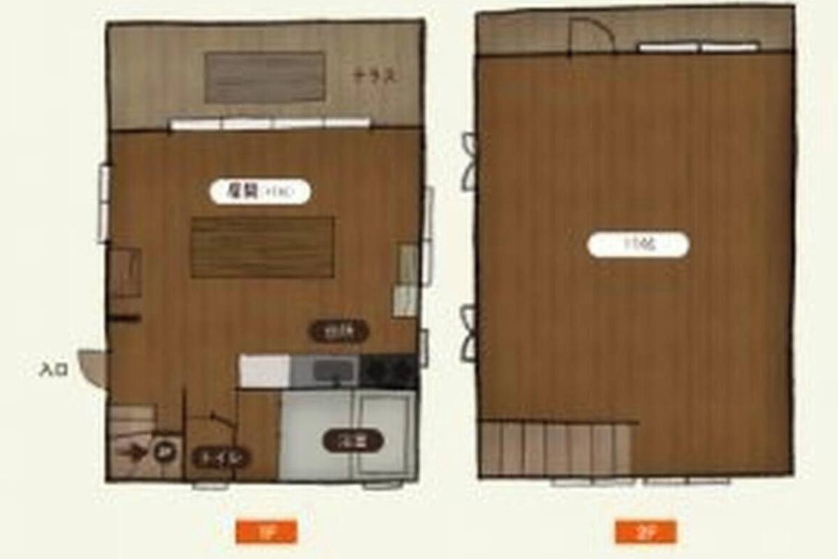 A floor plan of a hotel room with a kitchenette, a bathroom, and a seating area.