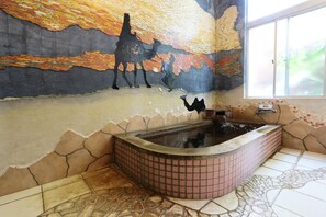 A bathroom with a mosaic wall, a bathtub, and a window. - Oonoso (Onjuku)