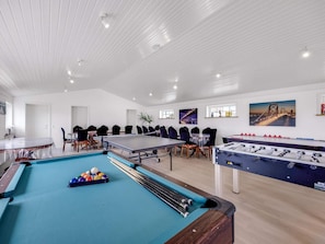 A spacious indoor recreational area with a pool table, foosball table, and a billiards table. - 4 Star Holiday Home in Lokken (Lokken)