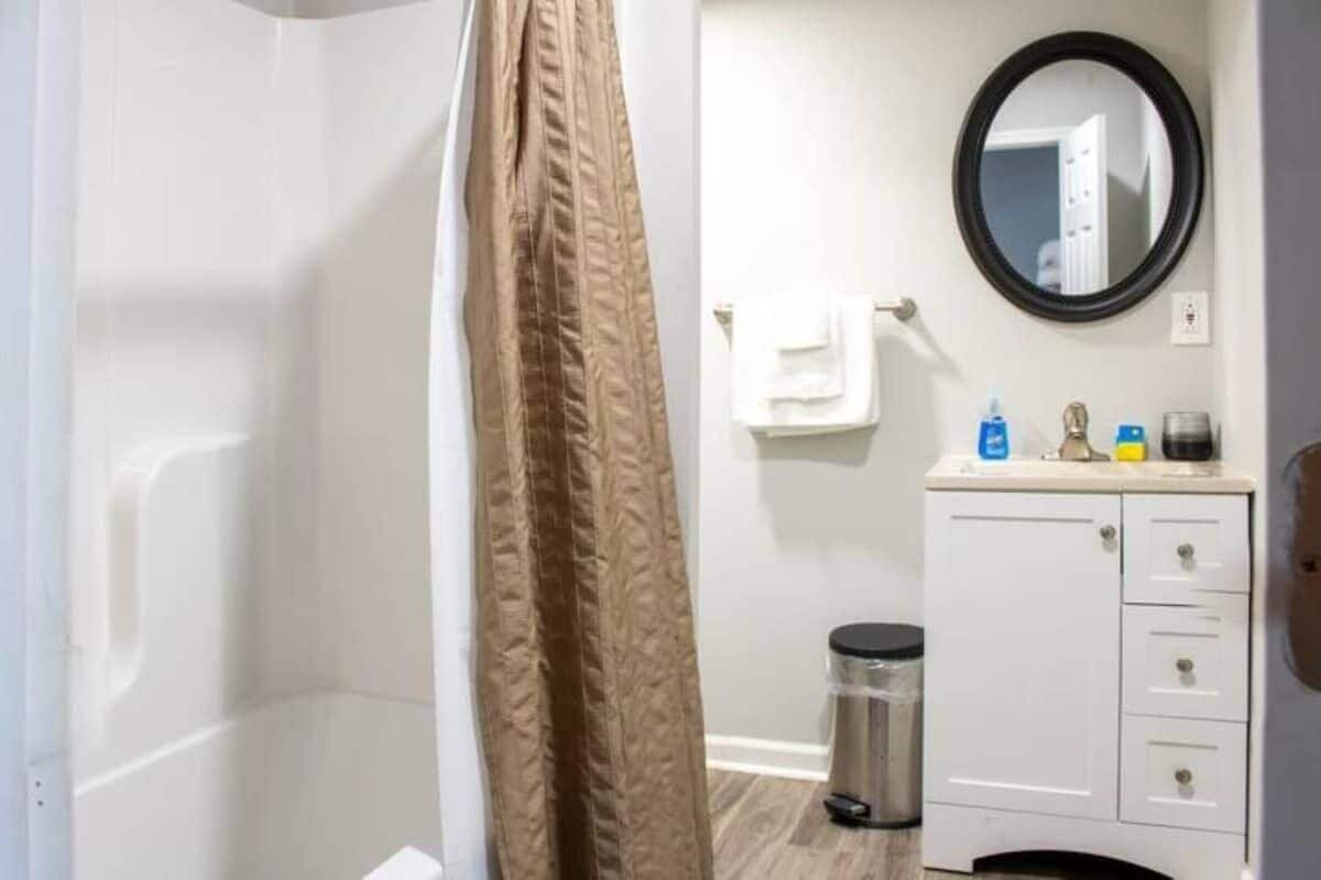 Shower, hair dryer, towels, shampoo