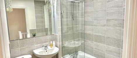 Hair dryer, towels, soap, toilet paper