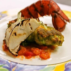A lobster tail with grilled meat and a side of green vegetable. - Izukogen Hanairotei (Ito)