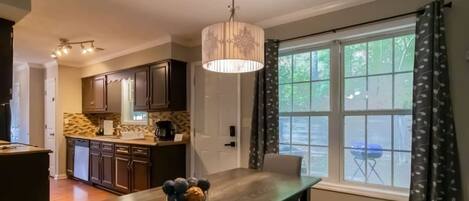Coffee/tea maker, fridge, microwave, oven