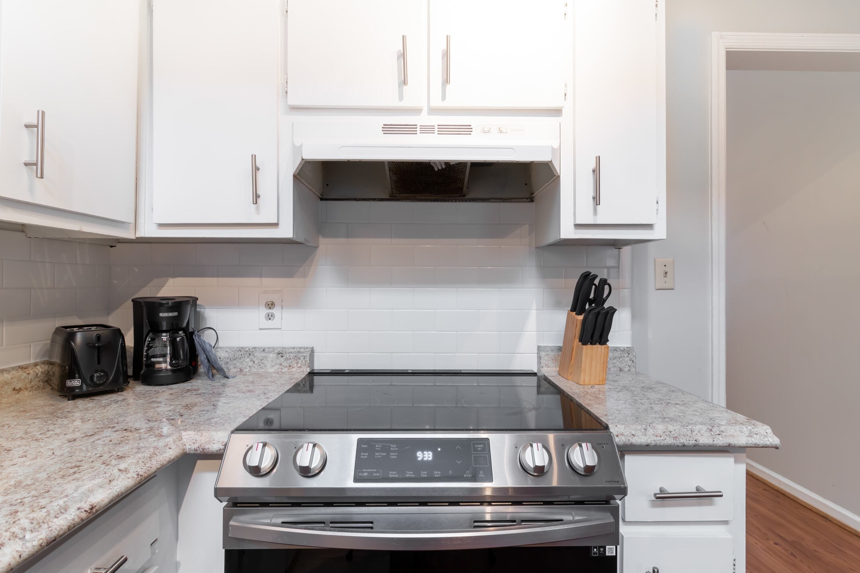 Coffee/tea maker, fridge, microwave, oven