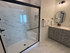 Shower, hair dryer, towels, soap