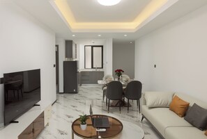Exclusive Apartment, Balcony, City View | Living area - Pinnacle Moments Residence (Phnom Penh)