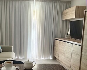 Living area - Sant’Eugenio Basso. Extraordinary Penthouse near the Beaches with Breathtaking Ocean View (San Eugenio Alto)