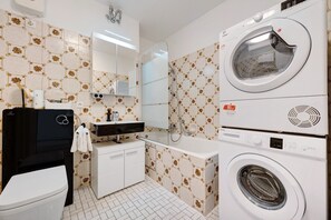 Shower, hair dryer, towels
