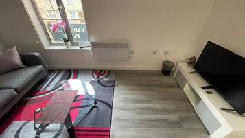 Appartement | Coin séjour | Télévision LED de 40 pouces avec chaßnes par cùble
