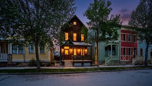 A wooden house with a porch, a stone foundation, and a street view. - Riverwalk Path! Heart of South Main w/ Peak Views (Buena Vista)