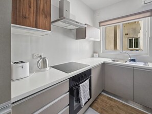 Private kitchen - Centrally located, well finished two bedroom, 1 bathroom apartment (San Pawl il-Baħar)