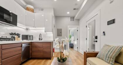 Luxury 1BR: Sleek Kitchen + City Charm | Suite 2