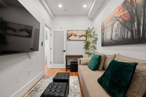 TV - Cityscape 1BR Plus: King + Queen Pull-out | Suite 7 (Boston)
