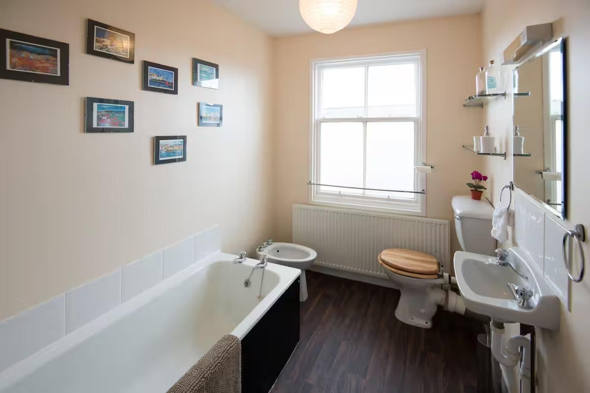 Combined shower/bathtub, deep-soaking bathtub, hair dryer, towels