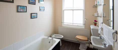 Combined shower/tub, deep soaking tub, hair dryer, towels