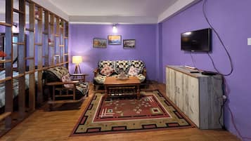 Chambre Familiale, balcon | Coin séjour