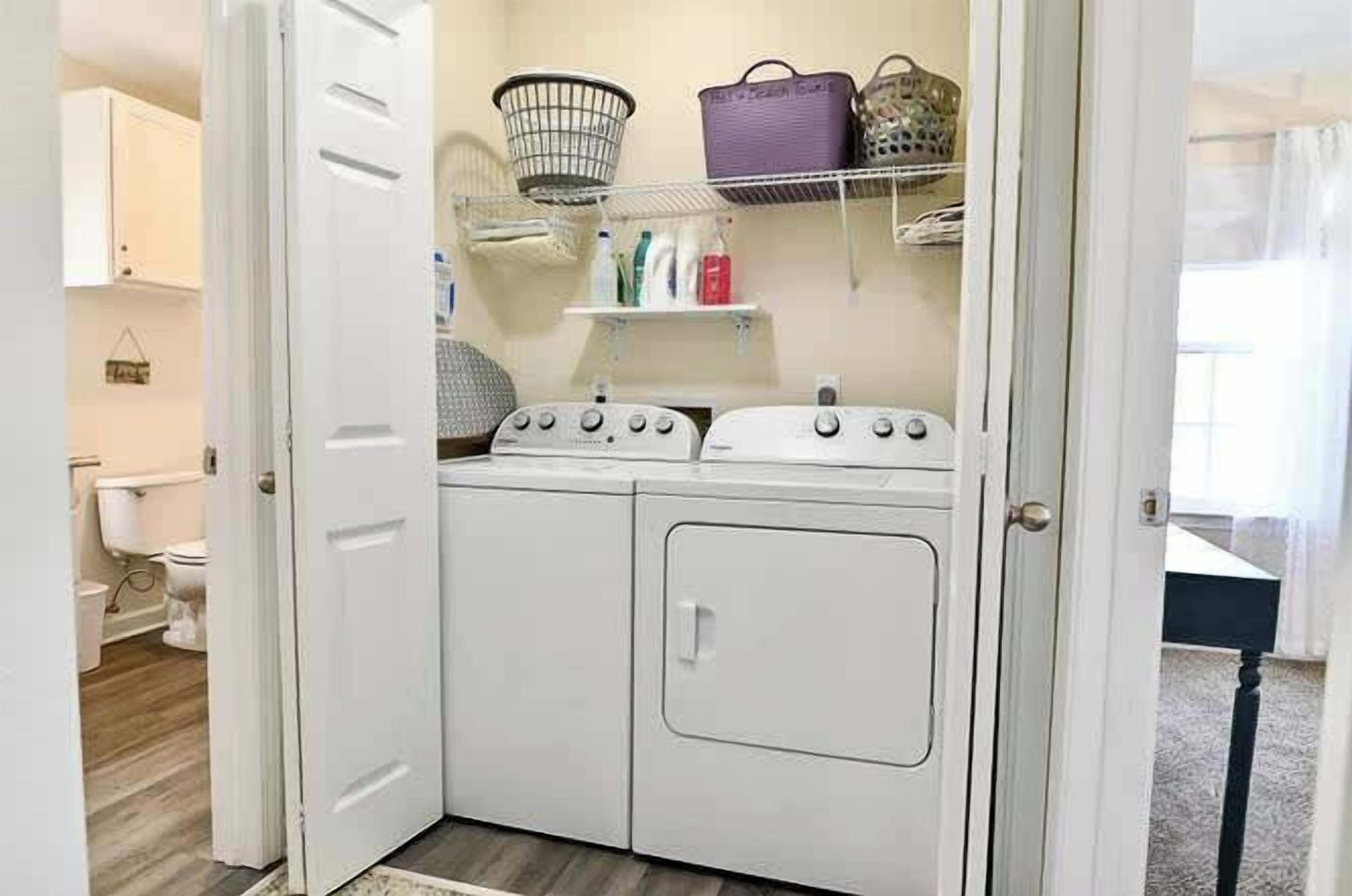 Shower, hair dryer, towels, shampoo