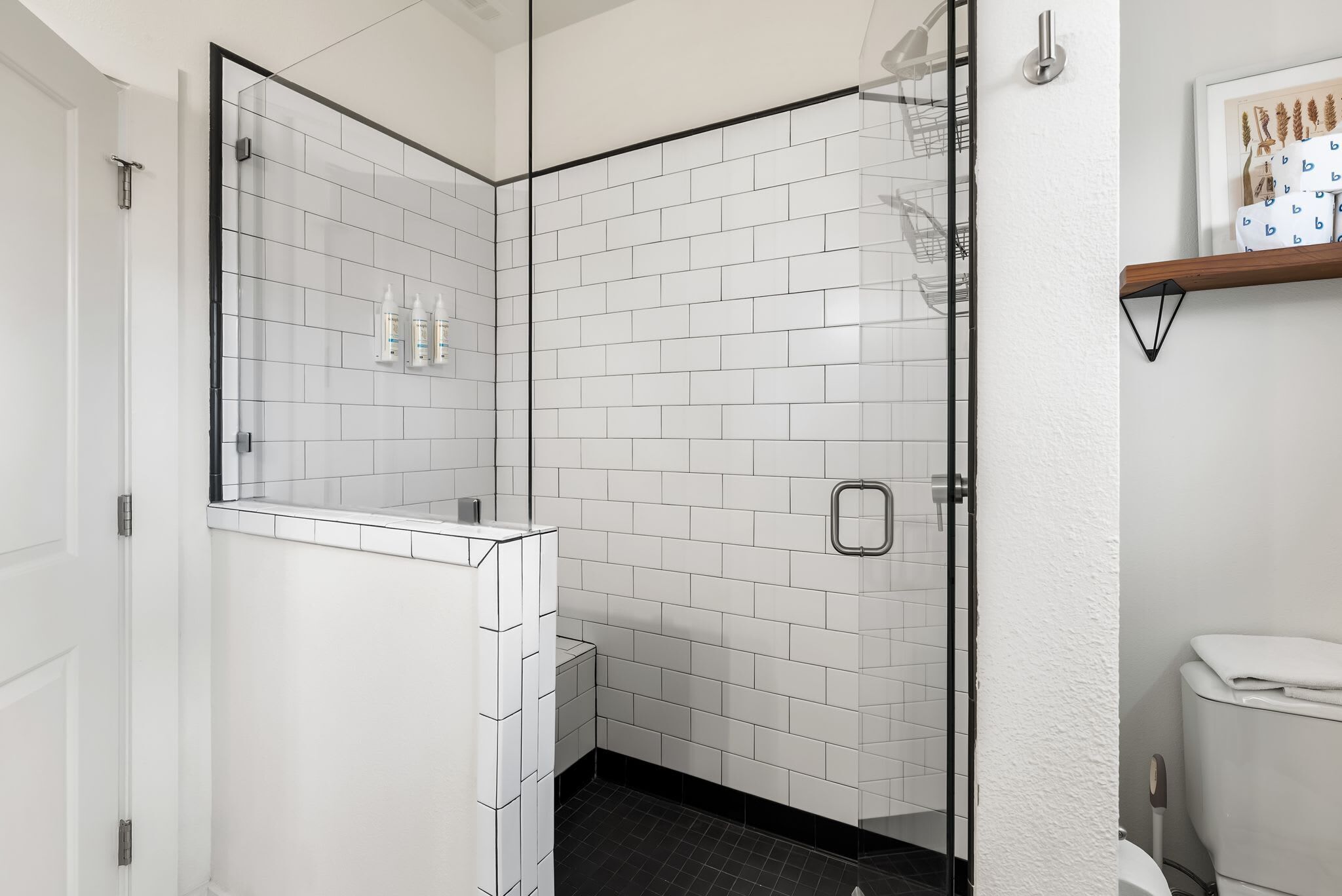 Shower, hair dryer, towels, shampoo