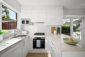 Fridge, microwave, oven, stovetop - Solara Sunlit Alfresco Living with Sauna (Glenelg North)