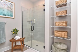 Shower, hair dryer, towels, soap