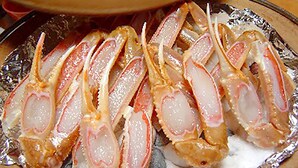 A tray of food items, possibly seafood, arranged on a foil-lined surface. - Ryokan Hama no Ya (Kyotango)