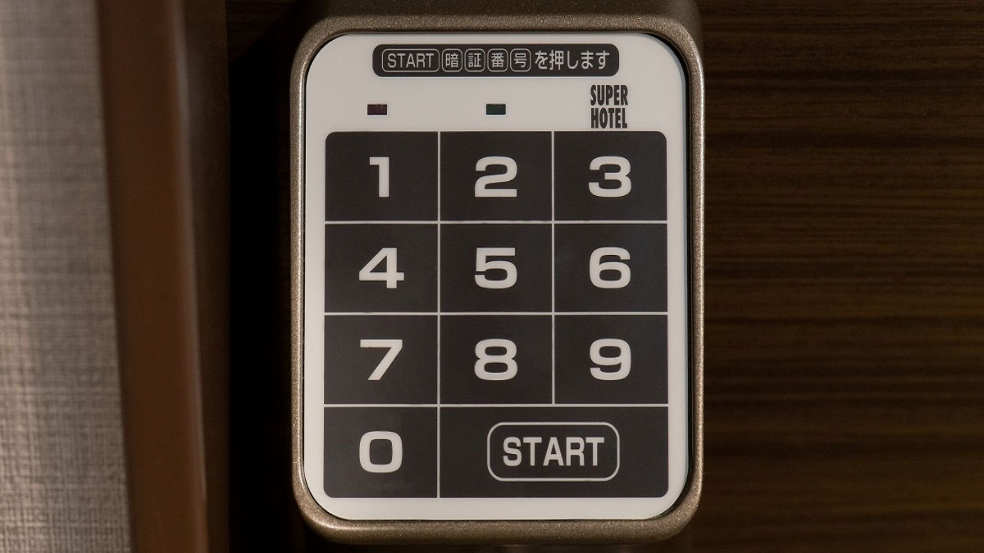 A numeric keypad with a 'START' button, likely for a hotel room entry system.