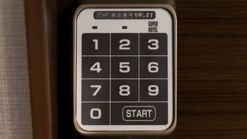 A numeric keypad with a 'START' button, likely for a hotel room entry system.