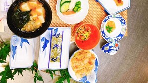 A variety of Japanese dishes arranged on a table, including rice, soup, and vegetables. - Ryokan Keizanso (Nasushiobara)
