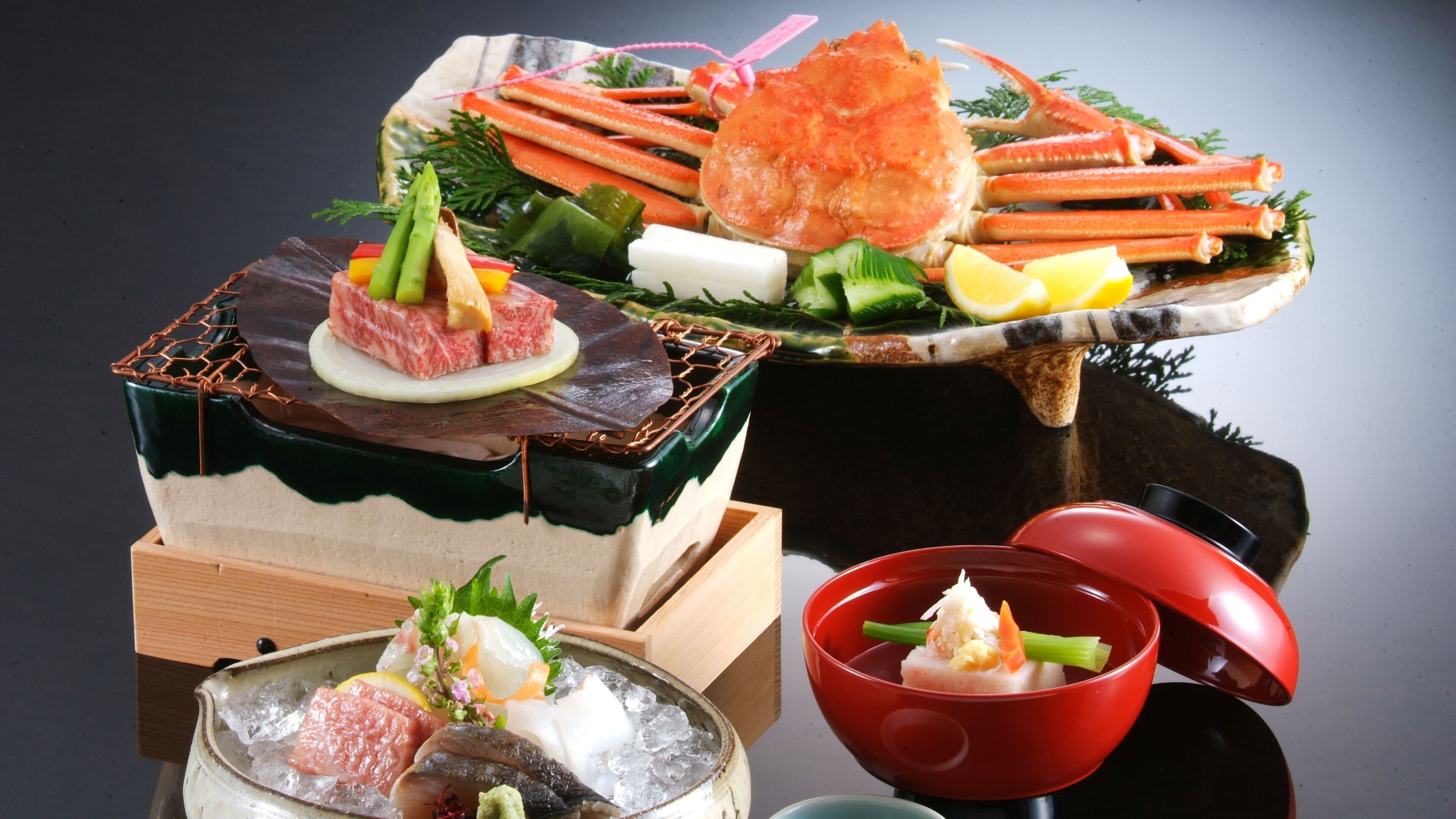 A variety of seafood dishes on a table.