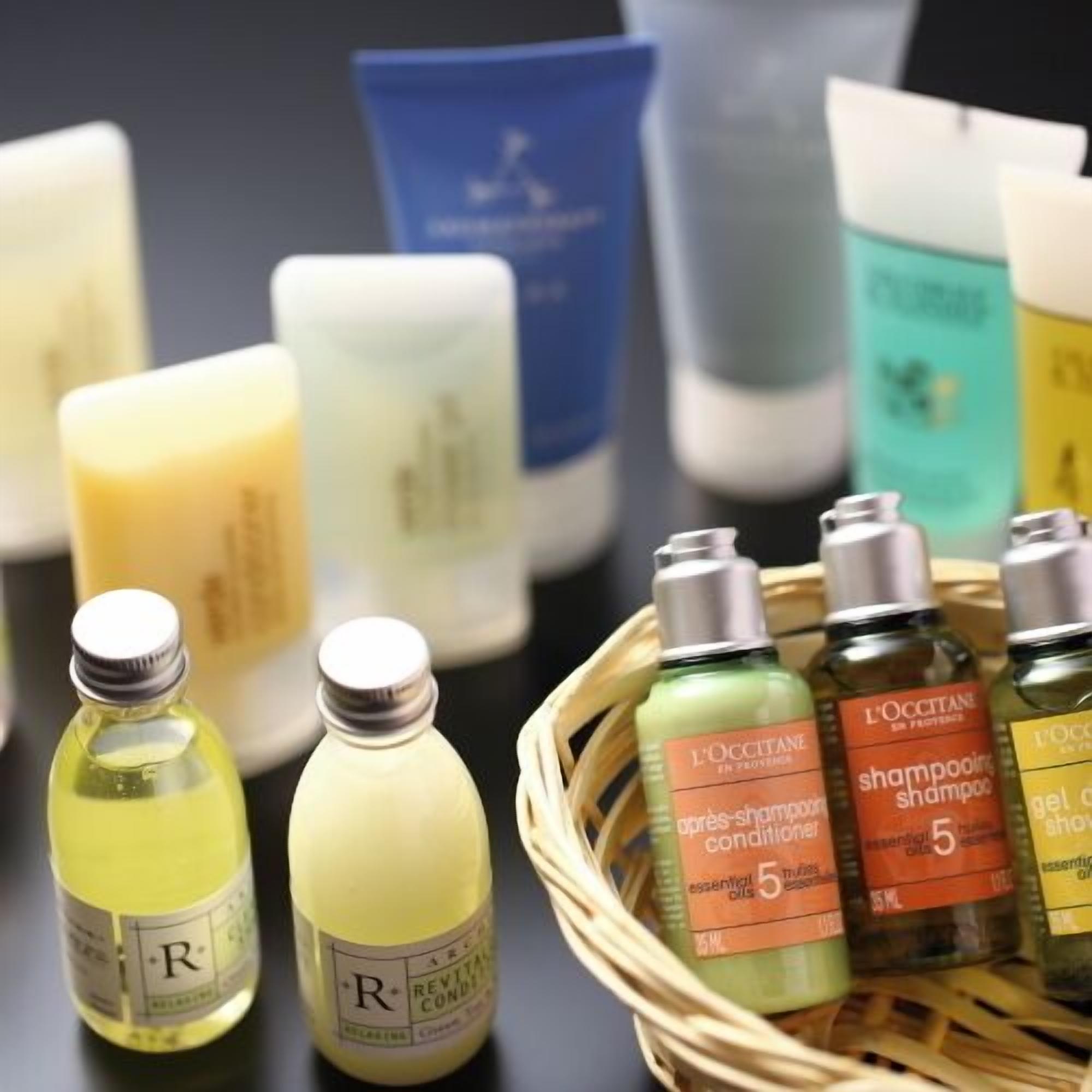 A variety of personal care products including shampoos and conditioners.