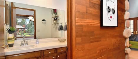 Shower, hair dryer, towels, shampoo