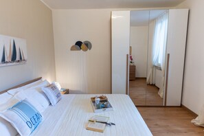 2 camere, ferro/asse da stiro