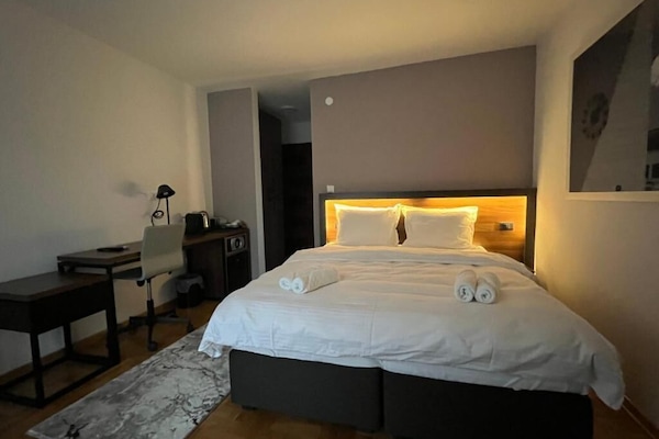 Deluxe Double Room, Balcony, Hill View | In-room safe, blackout drapes, iron/ironing board, free WiFi