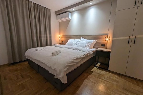 Apartment, Garden View | In-room safe, blackout drapes, iron/ironing board, free WiFi