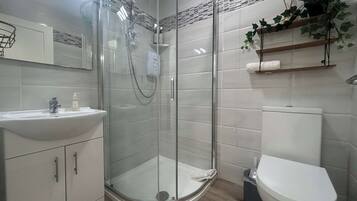Shower, hair dryer, shampoo