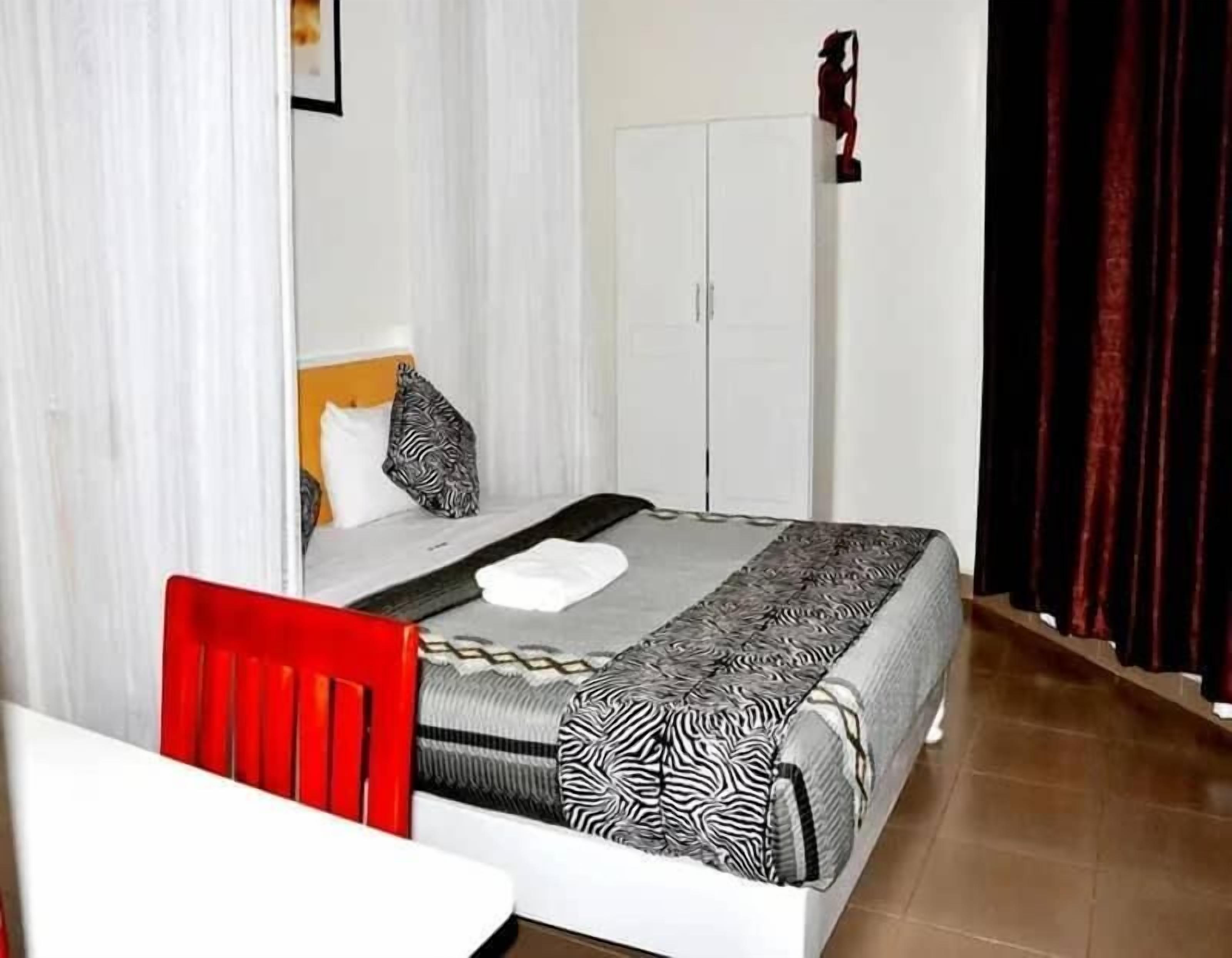 Blackout drapes, iron/ironing board, free WiFi