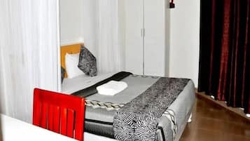 Blackout drapes, iron/ironing board, free WiFi