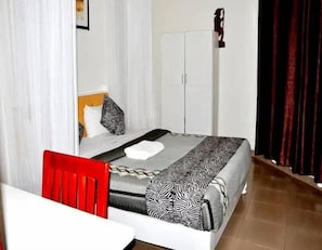Blackout curtains, iron/ironing board, free WiFi