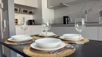 Family Apartment, Balcony, City View | Dining