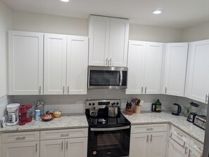 Fridge, microwave, oven, stovetop - 6BR Private Duplex for Groups -Near Beaches & Daytona, 2 Units, 2 Secure Garages (Palm Coast)